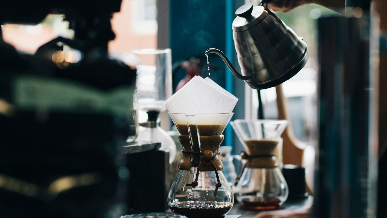 Close-up of a pour-over coffee filter — only what passes the filter reaches the cup
